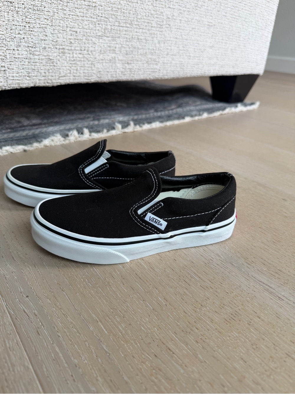 Vans Black & White Slip-On Sneakers